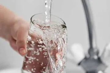 Getting glass of water from kitchen tap